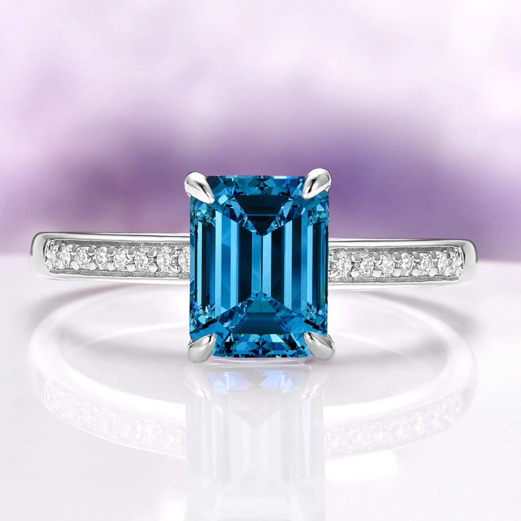 Emerald Cut Natural London Blue Topaz Ring in Sterling Silver