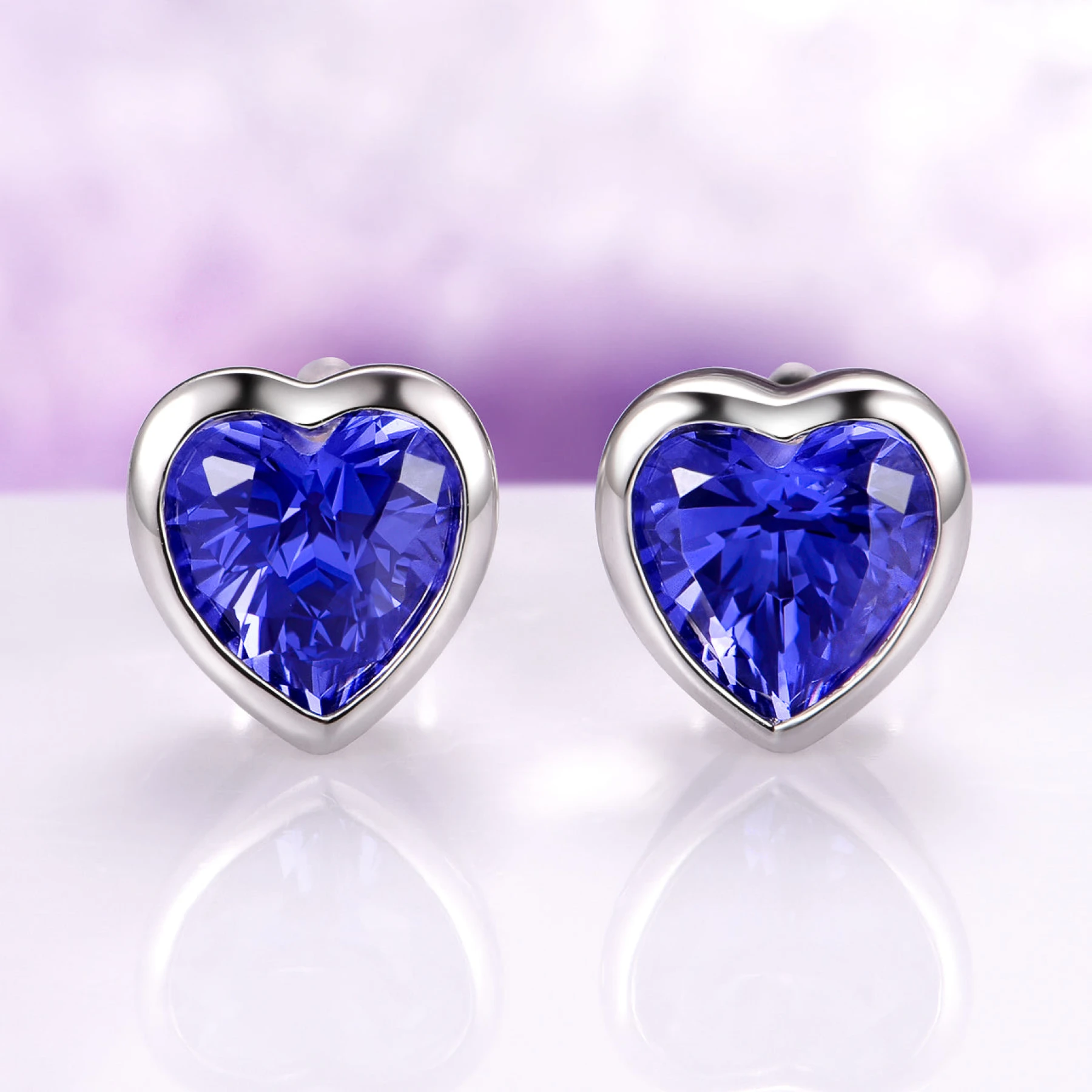 Heart Bezel Tanzanite Stud Earrings in Sterling Silver