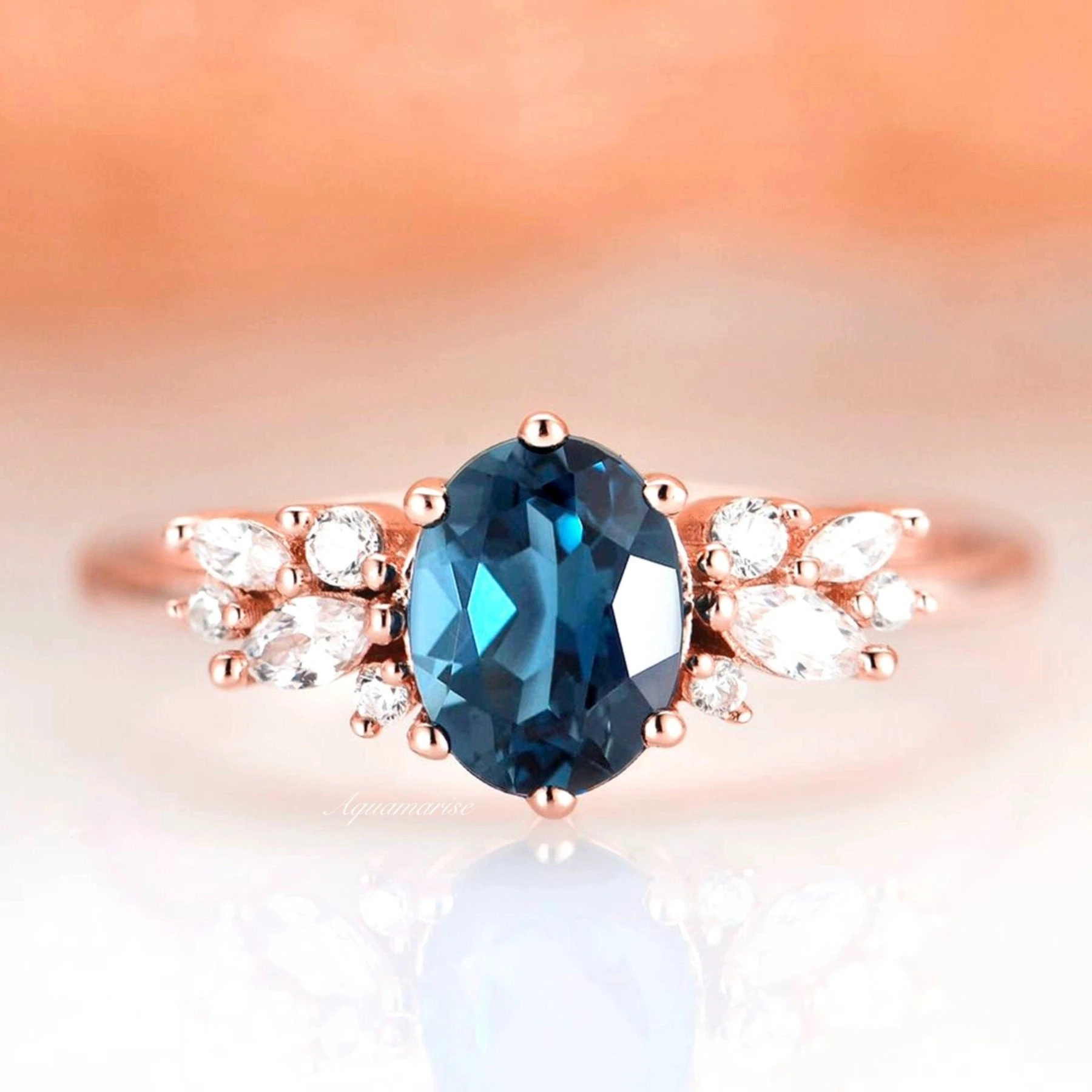 Lily London Blue Topaz Ring in 14K Rose Gold Vermeil