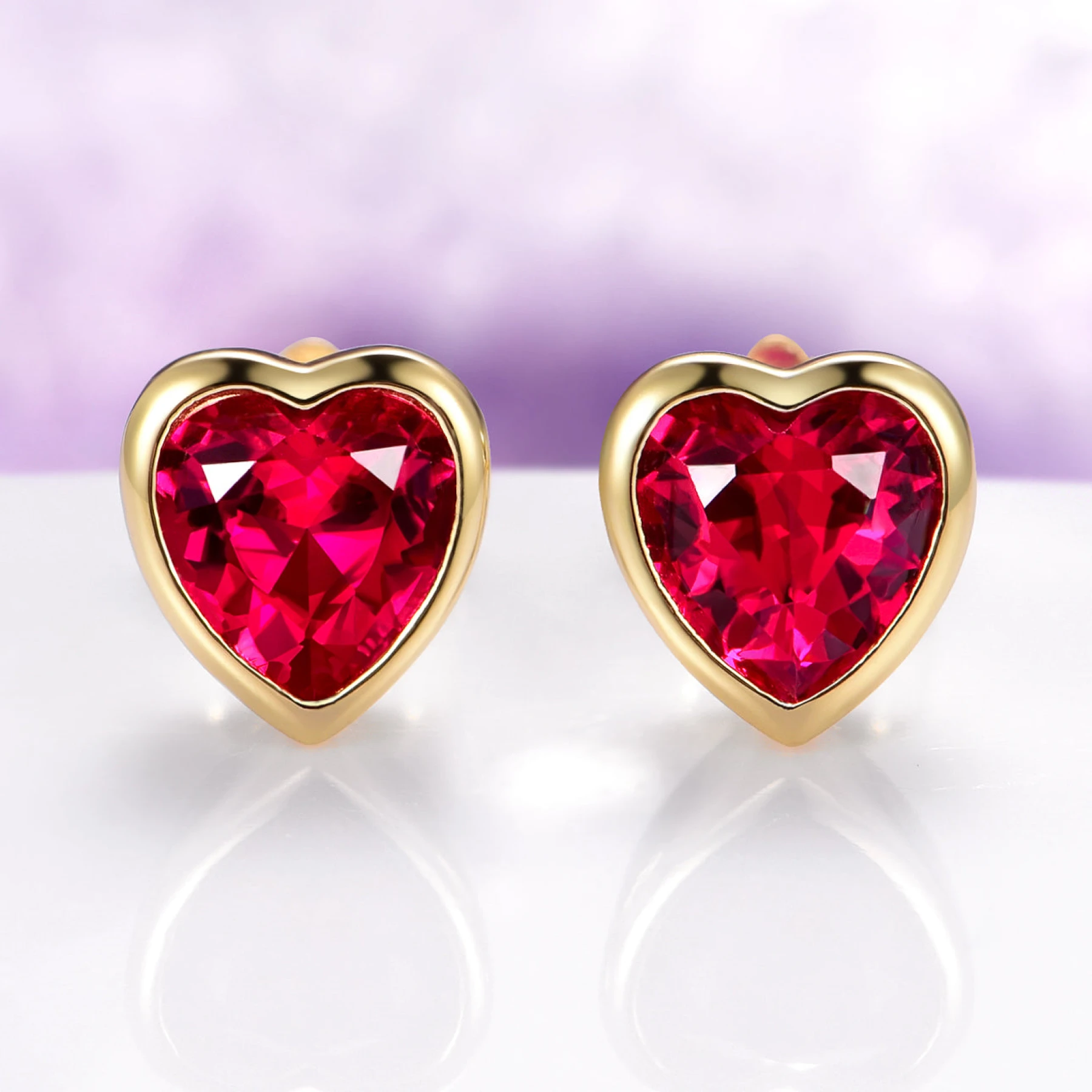 Heart Bezel Ruby Stud Earrings in 14K Yellow Gold Vermeil