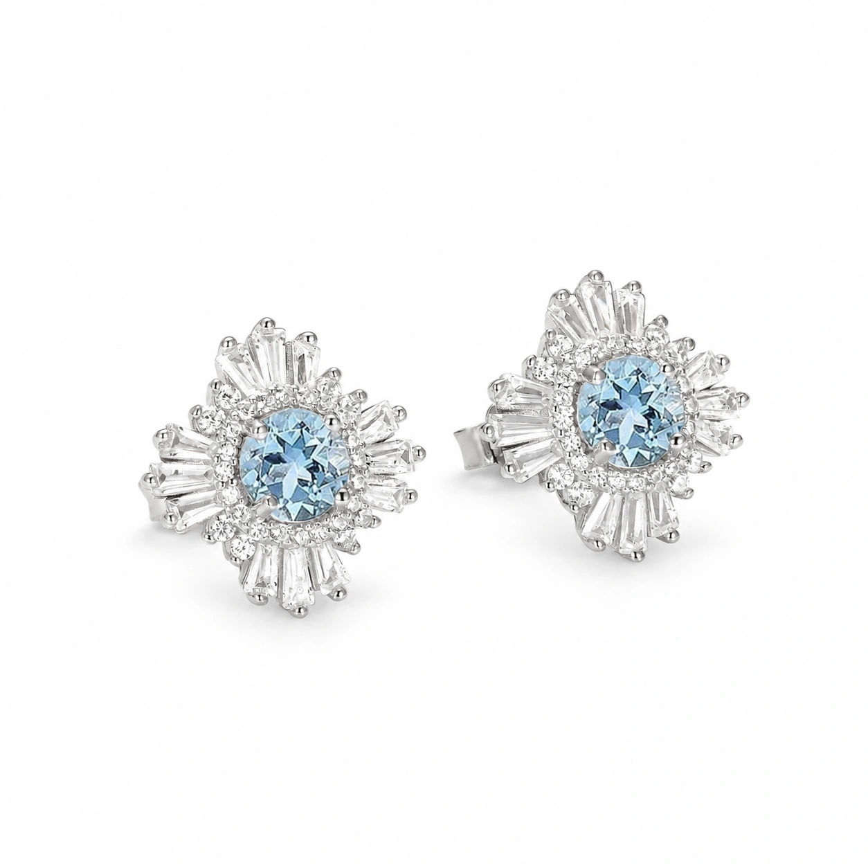 Joelle Art Deco light blue stud earrings, angled view with backs on white