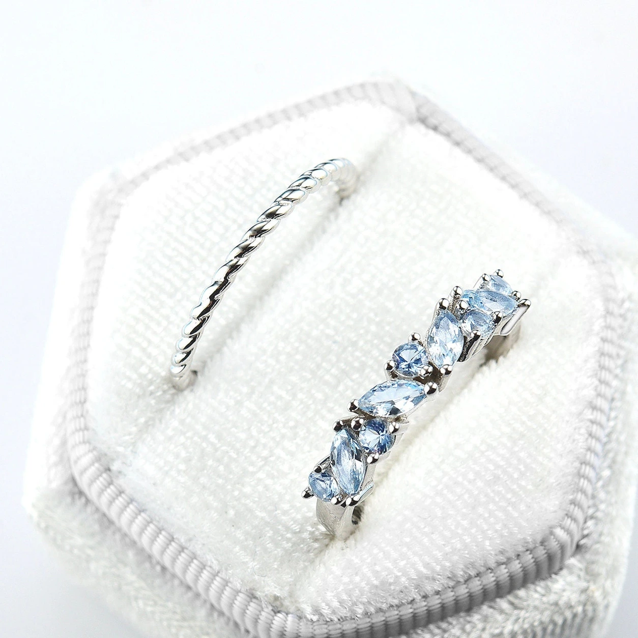 Willow aquamarine two-piece stacking ring set on velvet display