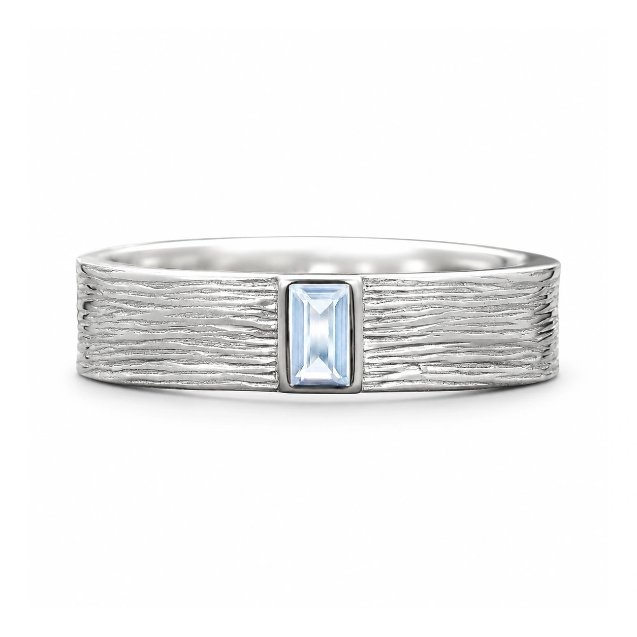 Front detail of the pale blue rectangular stone and organic grooves of the silver-tone band on white.