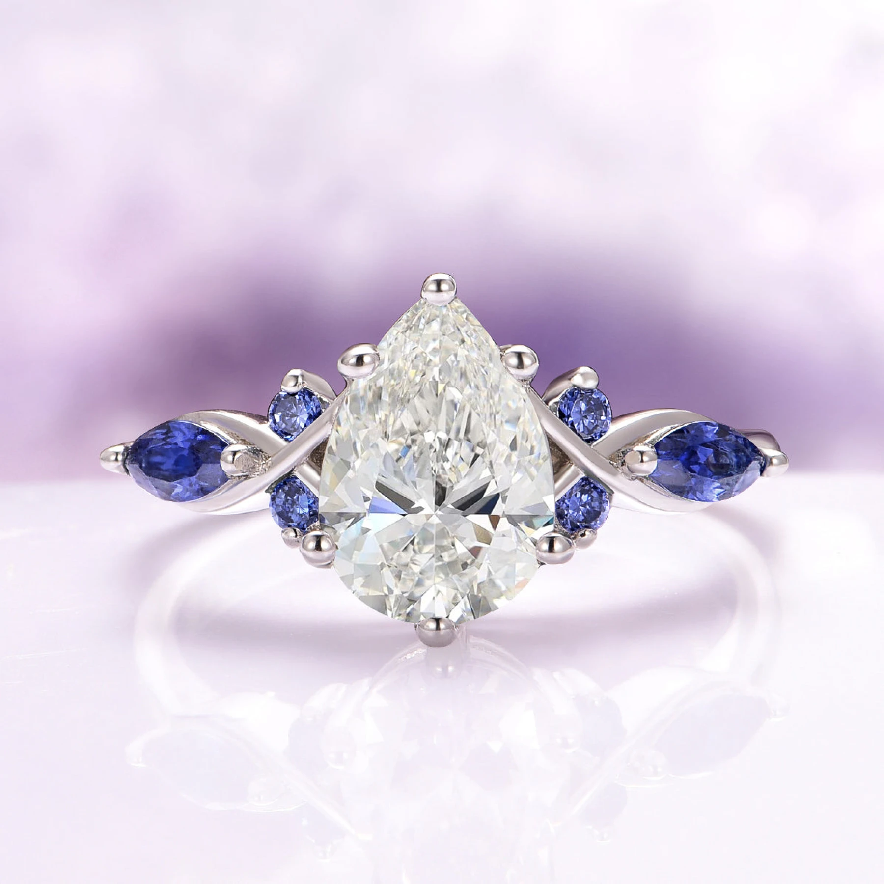 Feyra Moissanite and Blue Sapphire Engagement Ring