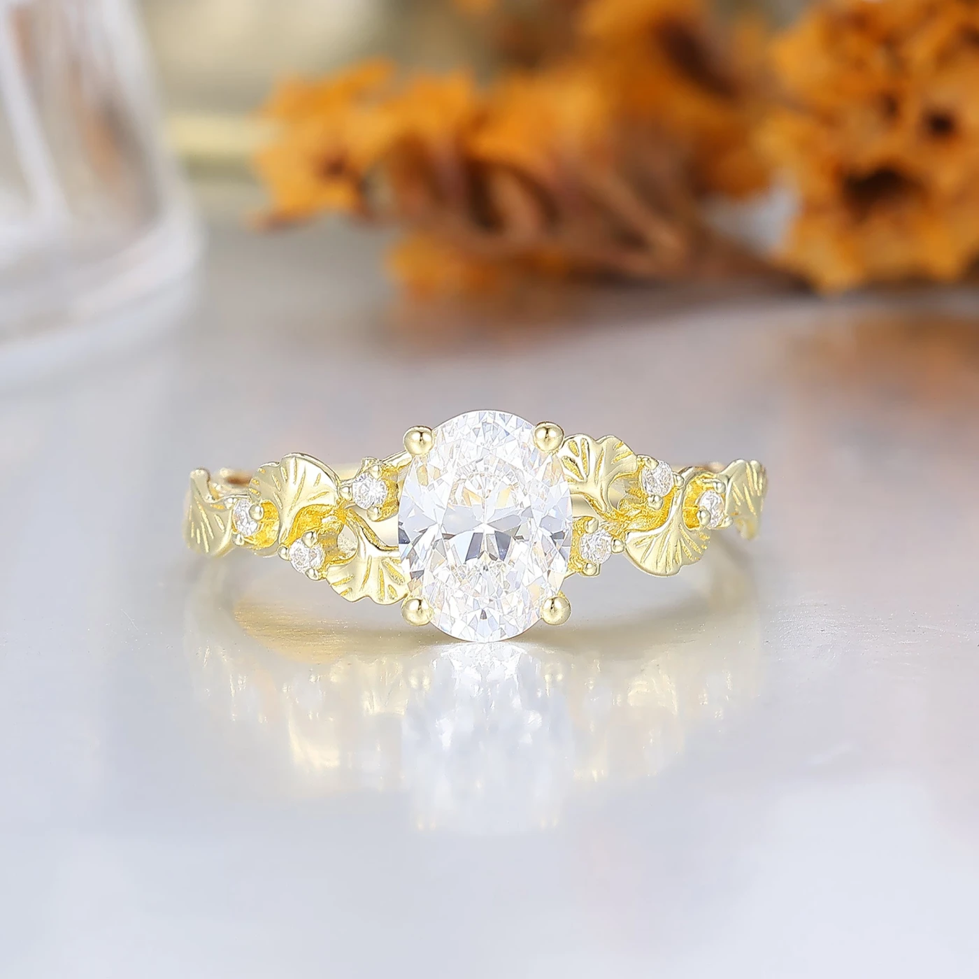 Refined Oval Ginkgo Leaf Engraved Engagement Ring