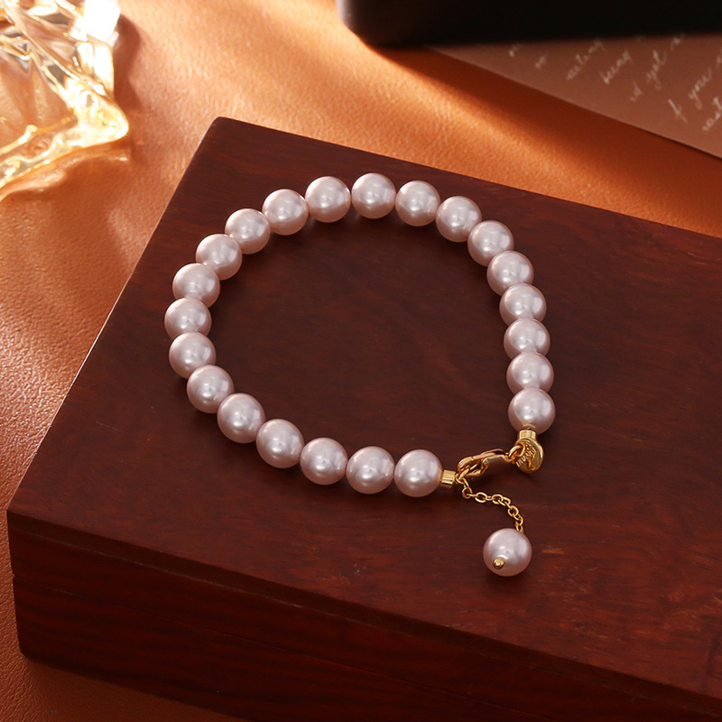 Juelvia "Timeless Elegance" Classic Golden Tone Pearl Bracelet