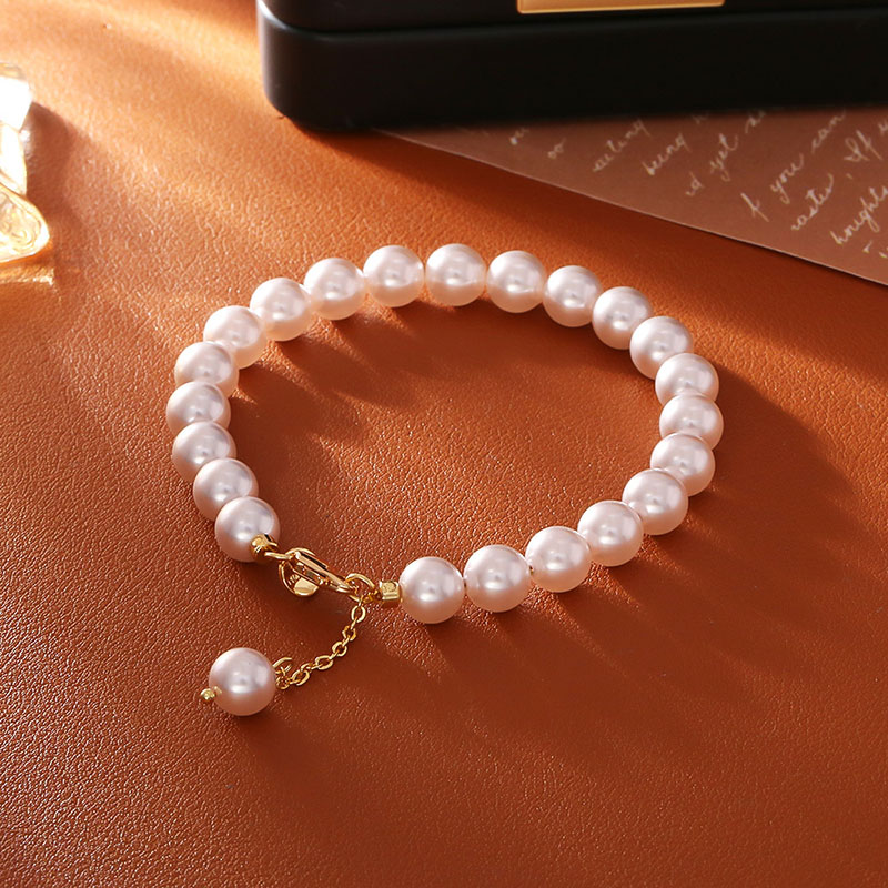 Juelvia "Timeless Elegance" Classic Golden Tone Pearl Bracelet