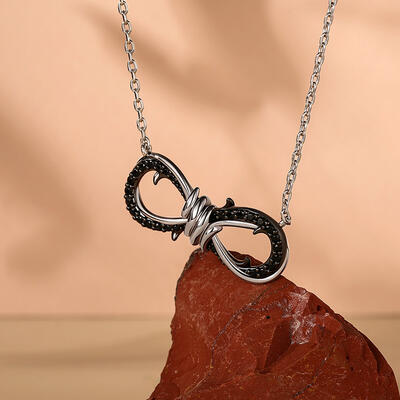Juelvia Two Tone Thorns Infinity Necklace with Black Stones