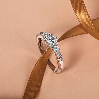 Juelvia Classic Two Tone Twist Three Stone Round Engagement Ring