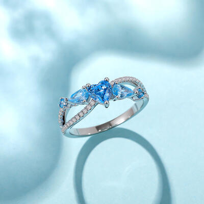 Juelvia Twist Multi Stone Aquamarine Infinity Promise Ring